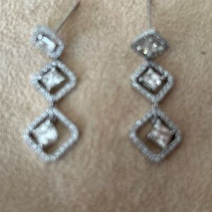 Diamond three tier drop earrings